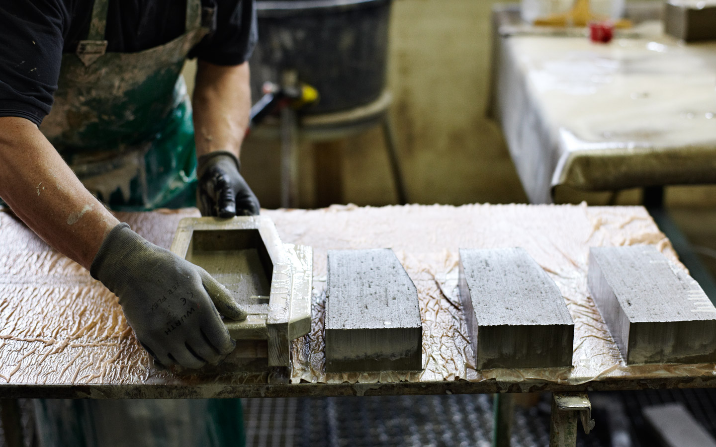 Craftsman hand-casting stone elements